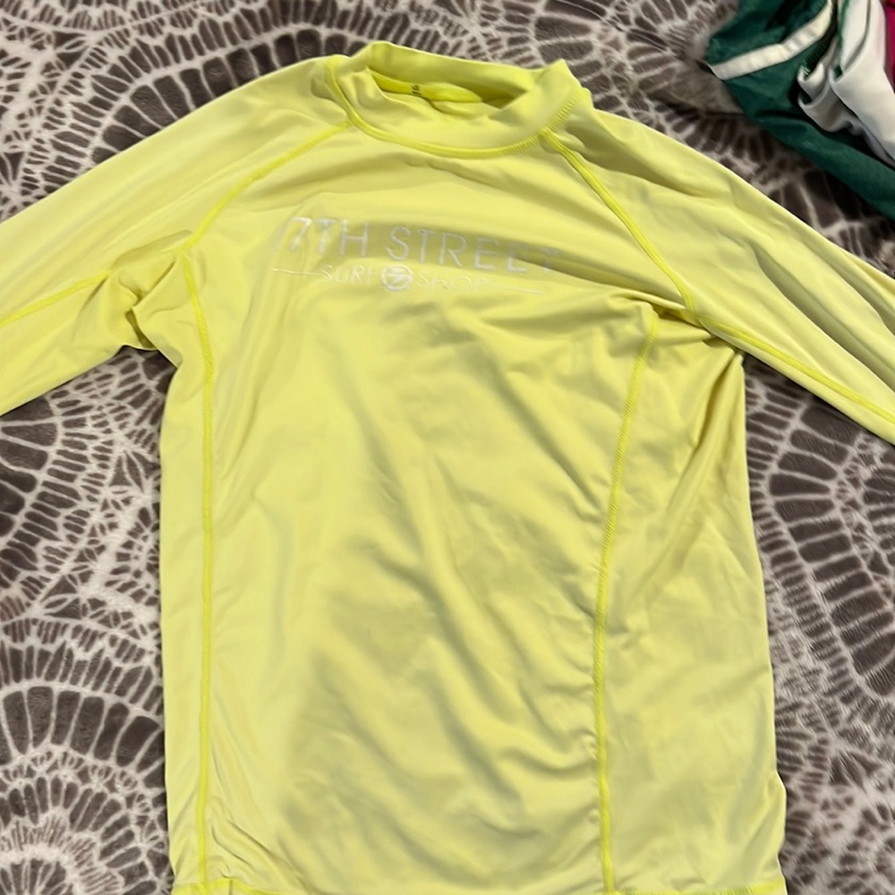 Local surf shop rash guard And SPF 50